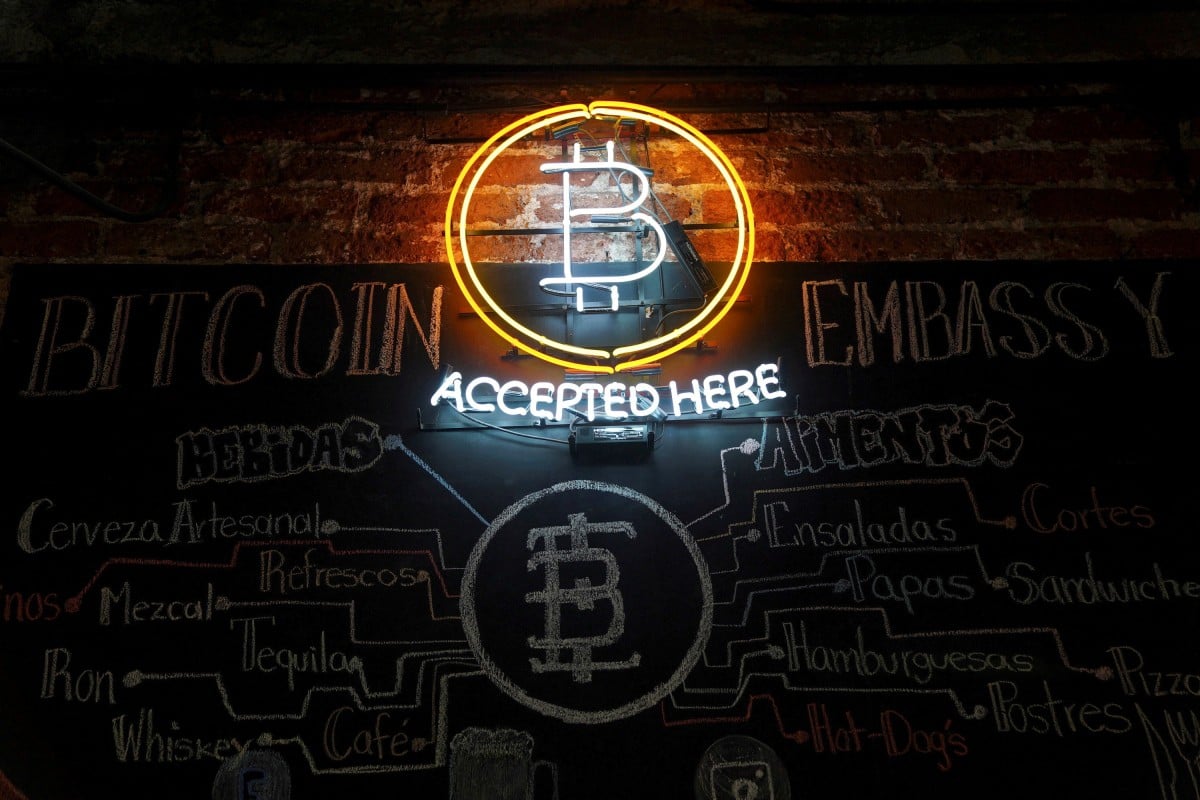 A neon logo of virtual cryptocurrency bitcoin is seen at the Bitcoin Embassy bar, June 1, 2021. Photo: Reuters